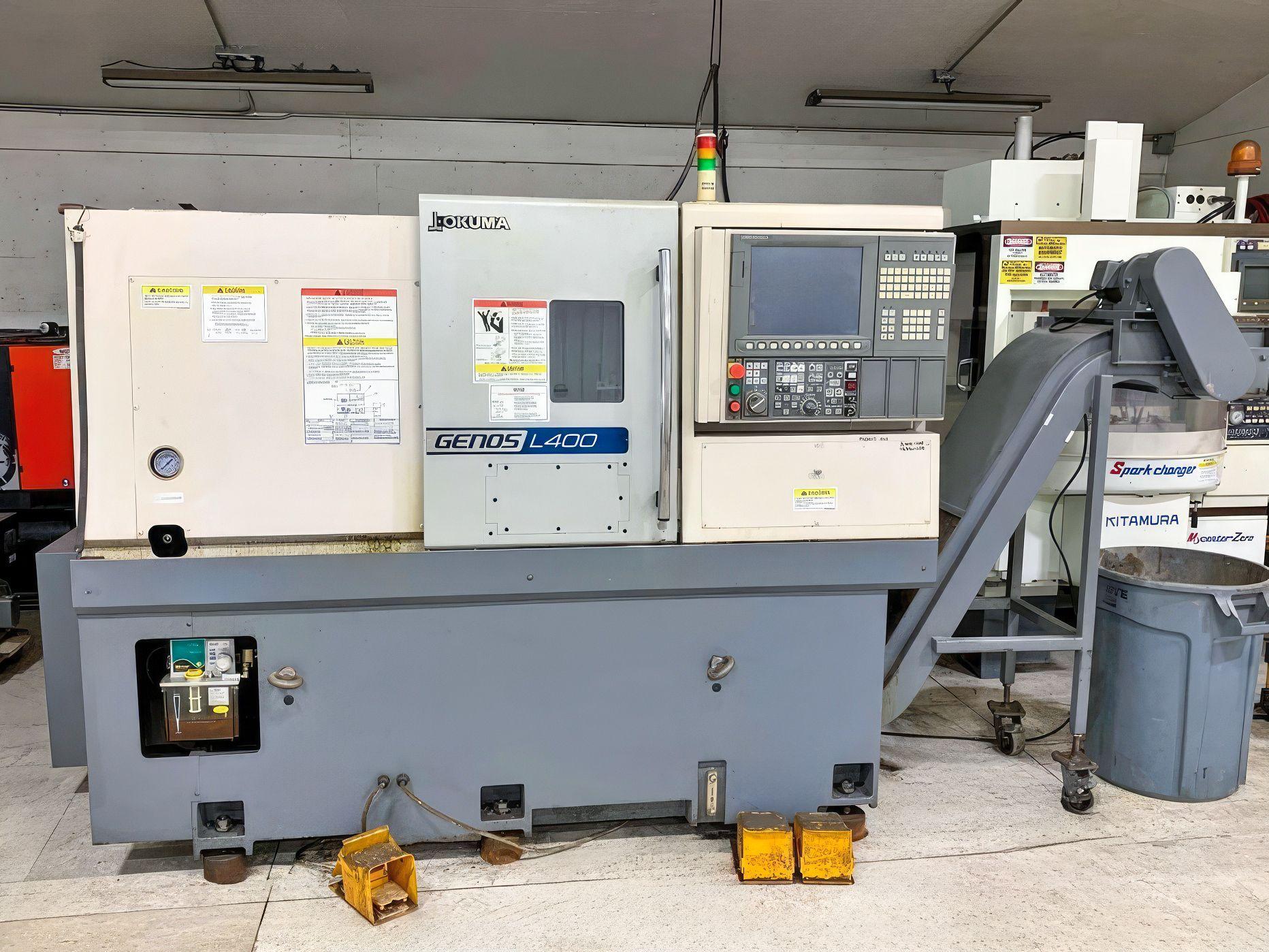 OKUMA GENOS L400 #GcRQdaWKOg3mieFZ8XlbaYSpf