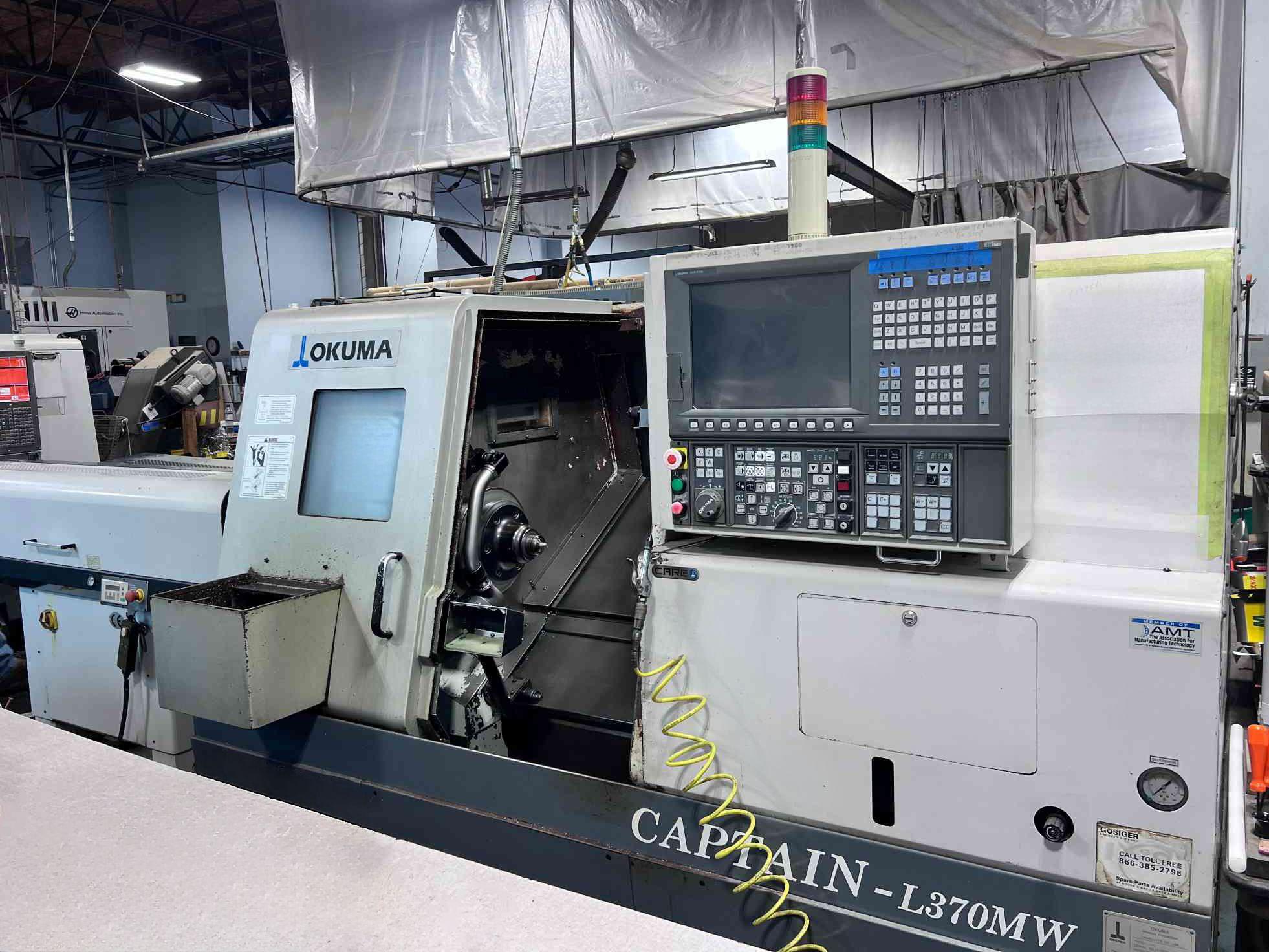 OKUMA CAPTAIN L370 #WfUi79TbKfTXCLbLbMhNr07AV